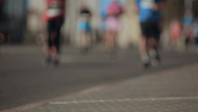 Health and sports. Group of marathon runners. Abstract blurry