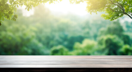 wooden table against a blurred green forest background, copy space