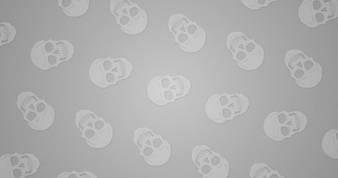 Seamless loop repeated pattern flat animated motion graphics background. Abstract pattern background. Individually Rotating human skull graphic over grey color background.