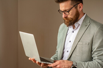 Portrait of successful businessman in office