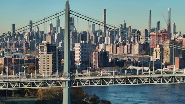 Drone shot of New York City on a fall morning. Shot in Astoria, Queens alongside the RFK Bridge.