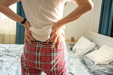 Spasm on the girl's back. Area of ​​the injury, the image on a clean background. Injuries to...