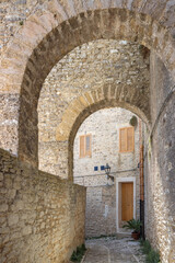 Fototapeta na wymiar Via San Carlo in Erice town in Sicily. A stone street of historic town near Trapani in northwestern Sicily, Italy, Europe.