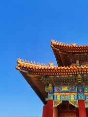 Vertical shot of a corner of an ancient temple in forbidden city googong