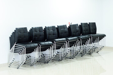 close up of a stack of chairs