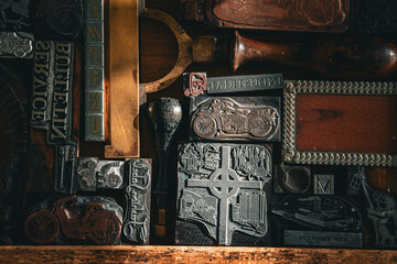 Vintage background printing press with frames and prints