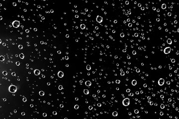 water drops on black surface, background - 678912283