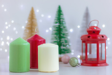 Candles and Christmas festive decor on table. decorations, celebration, winter holiday