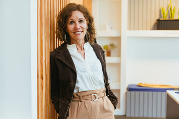 Earthy Tones Elegance: Businesswoman Over 50 in Office Attire