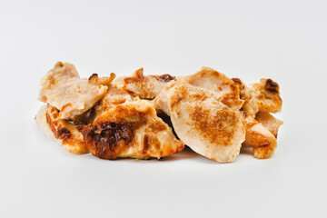 Fast cooking.Chicken fillets fried until half cooked, semi-finished product on a white background. Fast homemade food.Fast food. Quick cooking at home. Copy space.