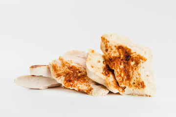 Fast cooking.Chicken fillets fried until half cooked, semi-finished product on a white background. Fast homemade food.Fast food. Quick cooking at home. Copy space.