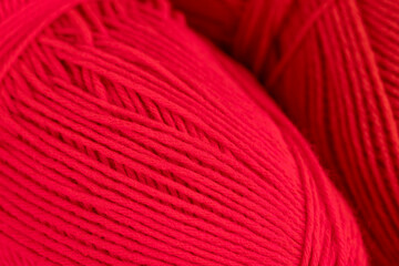 woolen threads of red color for knitting knitting close-up