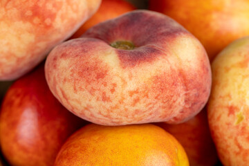 ripe delicious peaches on the table, making desserts