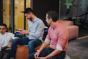 Multicultural team in a modern office engaging in creative brainstorming, discussing business strategies, and collaborating for company growth and profitability.