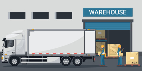 Exterior of an industrial warehouse with workers loading merchandise into a refrigerated container truck. Cargo and shipping logistics. Industrial storage and distribution of products