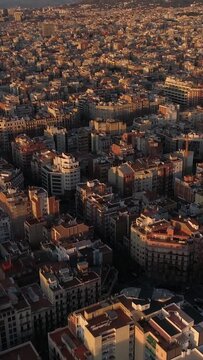 Vertical Video of Barcelona Skyline Typical Building at Sunrise Aerial View