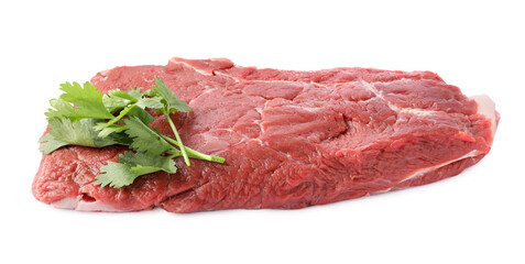 Piece of raw beef meat with parsley isolated on white