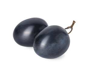 Two ripe dark blue grapes isolated on white