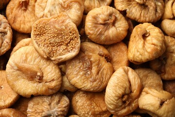 Many tasty dried figs as background, top view