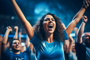 Enthusiastic female sports fan is fully immersed in the excitement of a soccer match with a high-energy crowd in background, her impassioned cheering shows the joy of sport - obrazy, fototapety, plakaty