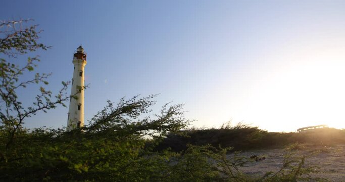 Lighthouse of sunset glow on light house - locked off