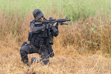 Thai female soldier in field training