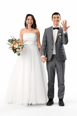 Naklejka premium Young wedding couple with bouquet of flowers on white background