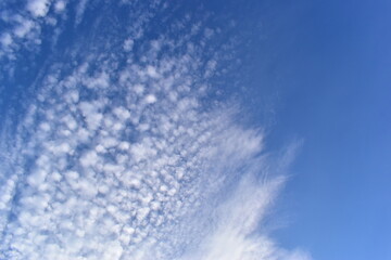 beautiful blue sky and white fluffy group of clouds in the morning, natural background