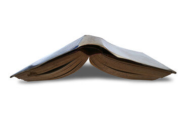 Rustic opened old book facing down on floor, cut out isolated