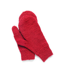Pair of red warm knitted mittens on white background