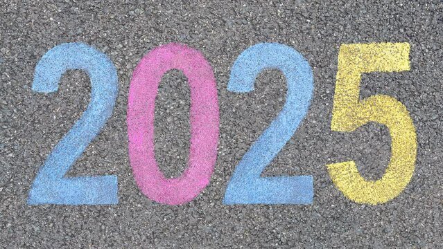 Start the New year Datum from 2020 to2030 stenciled in pavement paint on the asphalt, start trip concept. Celebration journey into the New Year numbers