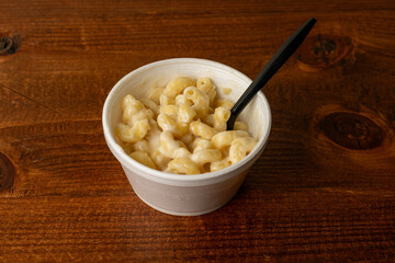Macaroni and cheese in a small cup