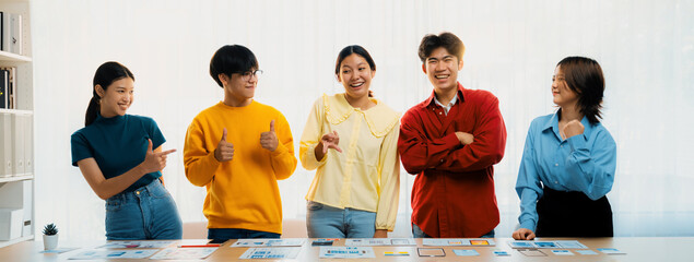 Panoramic banner young happy asian startup company employee wearing colorful casual wear stand in line together symbolize creative teamwork, job employment, HR agency recruitment. Synergic - obrazy, fototapety, plakaty