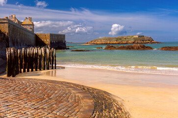 Fort National and beach at low tide, in beautiful walled port city of Saint-Malo, Brittany, France