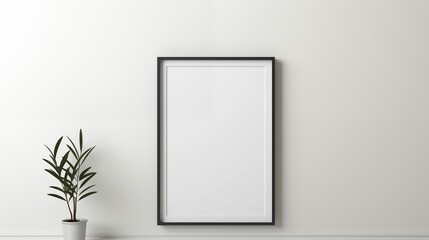 Image of a blank frame hanging on a white wall.