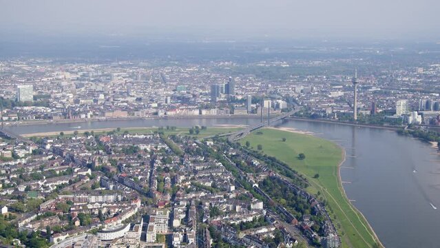 High resolution video from the City of Duesseldorf. It shows the river rhine in the foreground. In the background you can see the skyline of the city, including the rhinetower and the Medienhafen.