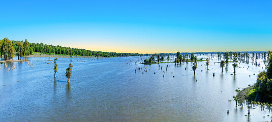 Lake Bigeaux under blue skies and white clouds in Louisiana