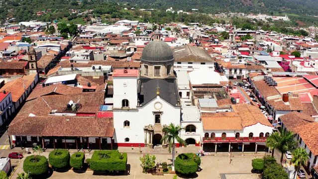 DRONE SHOT OF TACAMBARO MICHOACAN MAIN CHURCH AT THE PLAZA