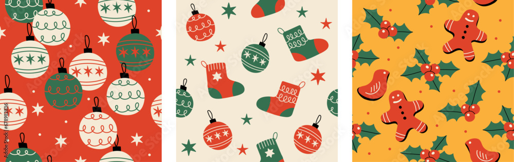 Wall mural a set of three seamless patterns with christmas motifs.