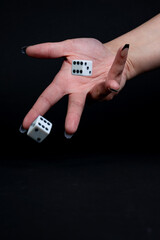 hand rolling dice