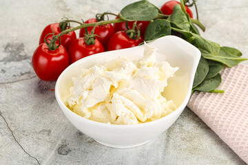 Soft cream cheese in the bowl