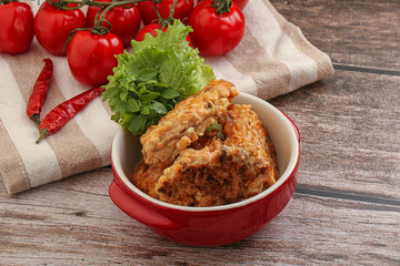 Fried salmonn cutlet in the bowl