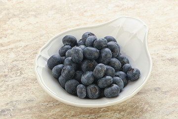 Sweet ripe blueberry heap in the bowl
