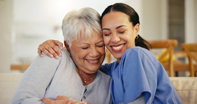 Happy woman, nurse and hug in elderly care for support, trust or love on living room sofa at old age home. Face of female person, doctor or medical caregiver hugging senior patient in relax at house