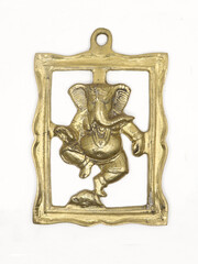 hindu elephant god ganesha dancing statue carved on a vintage door knocker isolated 