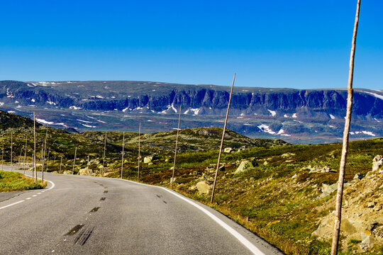 Road crossing Hardangervidda plateau, Norway