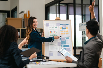 diverse team of professionals engaged in a website graphic design board meeting, sharing opinions on UX and UI design elements. Asian man, African American people, black, afro, caucasian female
