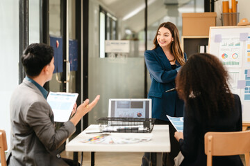 diverse team of professionals engaged in a website graphic design board meeting, sharing opinions on UX and UI design elements. Asian man, African American people, black, afro, caucasian female