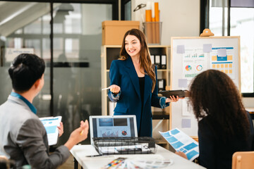 diverse team of professionals engaged in a website graphic design board meeting, sharing opinions on UX and UI design elements. Asian man, African American people, black, afro, caucasian female