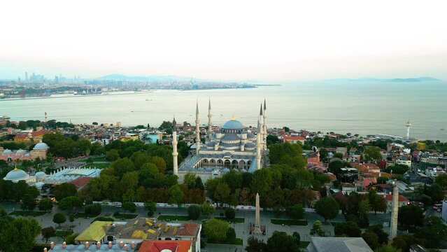 Cinematic Orbiting Aerial Drone View of The Blue Mosque in at Golden Hour in Istanbul, Turkey.